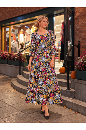 MD13277D-PL<br/>A charming plaid tiered dress featuring a flattering scoop neck line, 3/4 sleeves with ruffle cuffs, and delicate bow ac